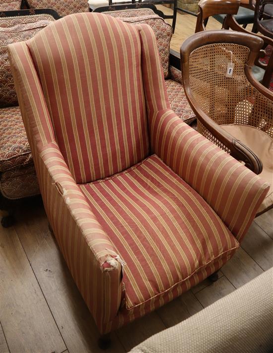 A 1920s upholstered armchair
